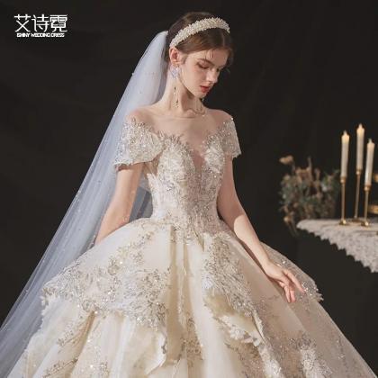 Feathered Off The Shoulder Glimmering Bridal Gown