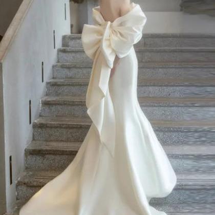 Ivory Dress with a Bow on the Back main image 1