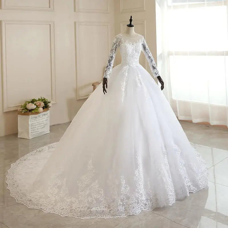 Glamorous Long Sleeves Ball Gown Wedding Dress with Lace Beadings main image 0