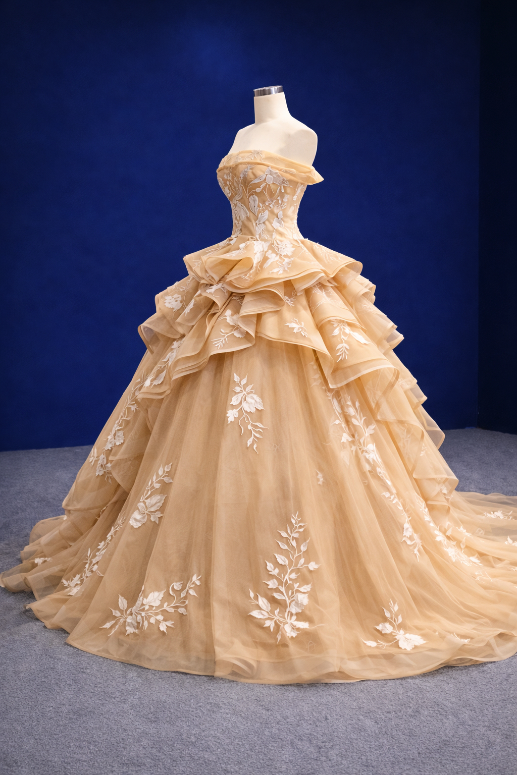 Champagne Gold Off Shoulder Layered Ball Gown With Floral Applique