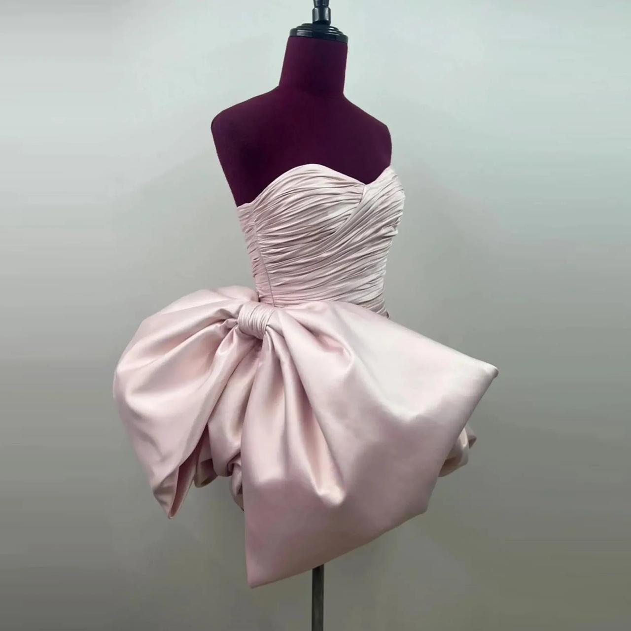 bow ruched strapless dress in pink Ava Presley Strapless Ruched Bow HoCo Dress 26310 Peacock / 00