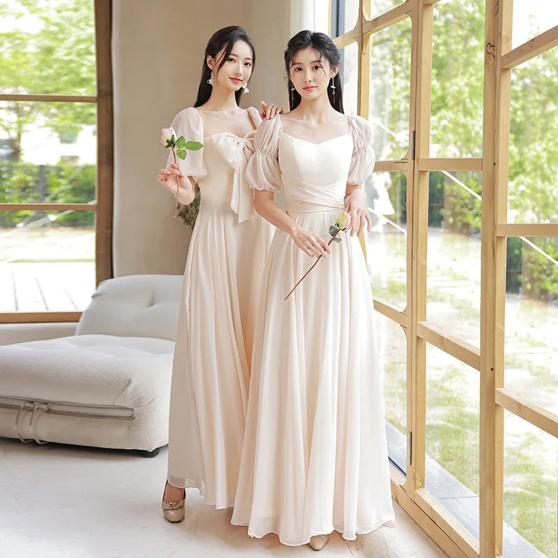 Chiffon Gown With Puff Sleeves And Bow