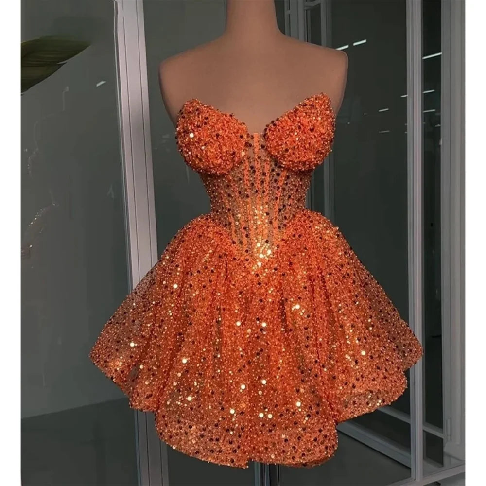 strapless open back dress Nana Gotti Coral Strapless Sequin Dress