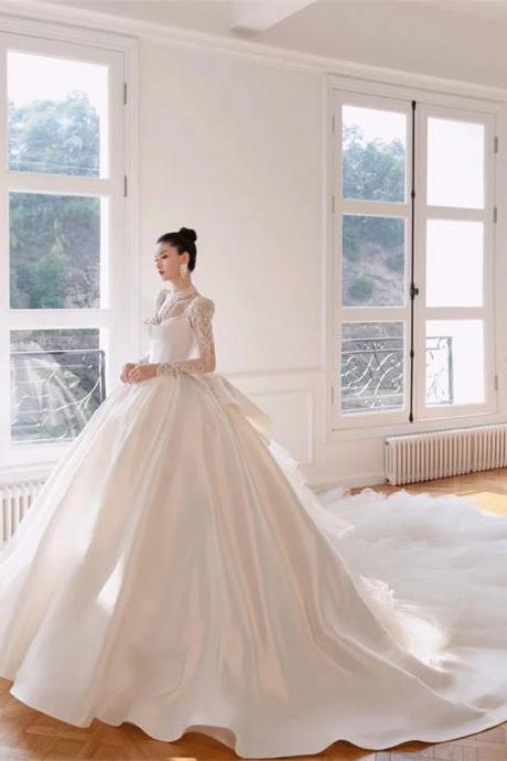 Elegant White Long-sleeve Ball Gown Wedding Dress