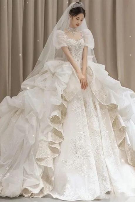 Elegant Off-shoulder Bridal Gown With Embroidery And Veil