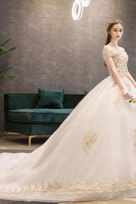 Elegant Off-shoulder Bridal Gown With Golden Embroidery