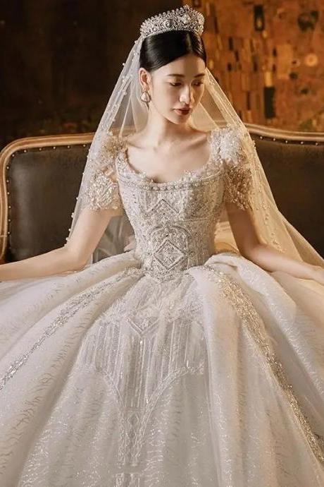Elegant Off-shoulder Crystal Beaded Bridal Ball Gown