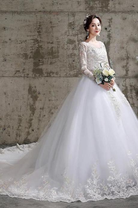Elegant Long-sleeve Lace Wedding Dress With Train