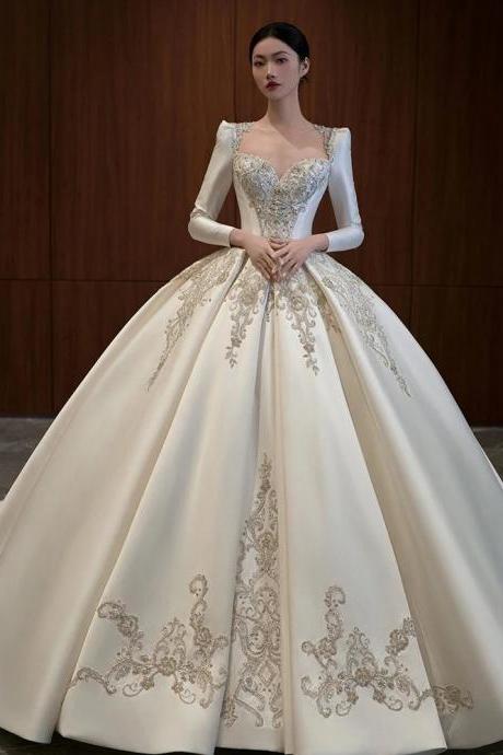 Elegant Long Sleeve Satin Ball Gown With Embroidery