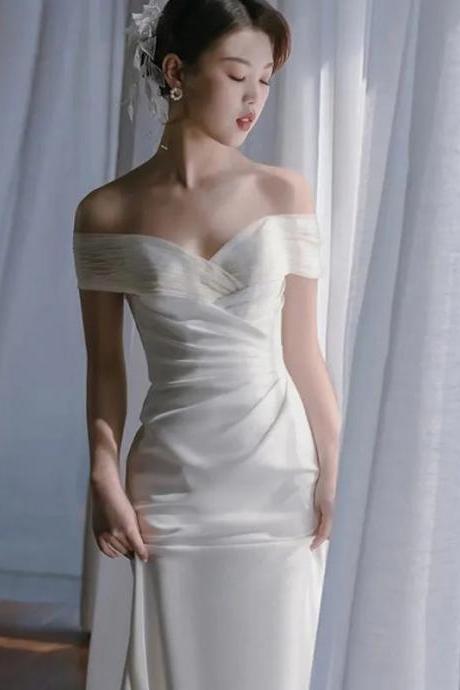Elegant Off-shoulder Satin Mermaid Bridal Gown