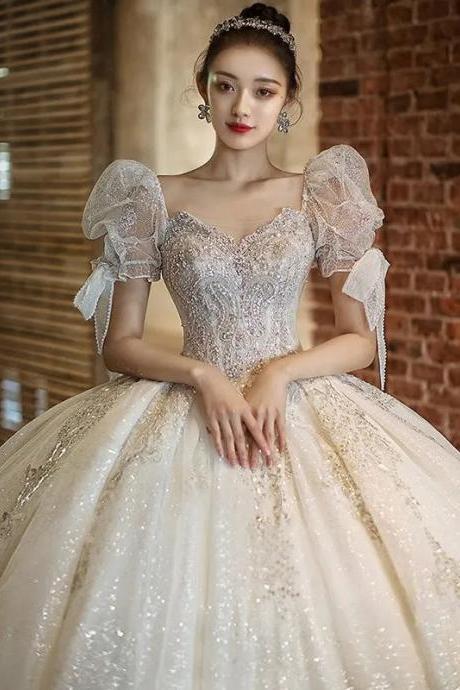 Elegant Off-shoulder Lace Bridal Ball Gown With Sleeves