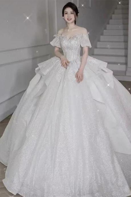 Off-shoulder Sparkling Bridal Gown With Cinched Waistline