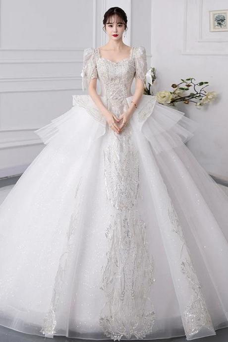 Elegant Beaded Off-shoulder Bridal Gown With Train