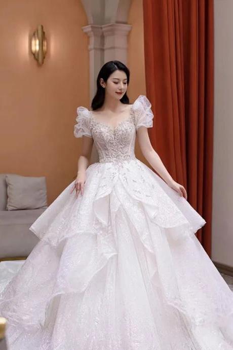 Elegant Off-shoulder Lace Bodice Bridal Gown With Train