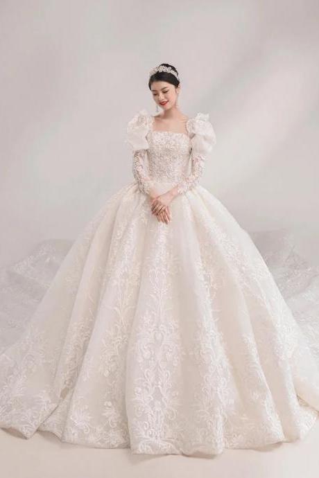 Elegant Off-shoulder Bridal Gown With Puffed Sleeves