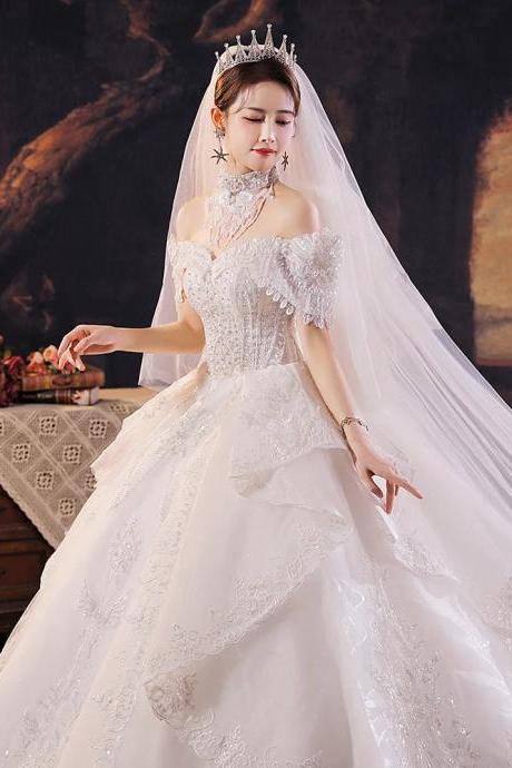 Elegant Off-shoulder Bridal Gown With Lace Embellishments