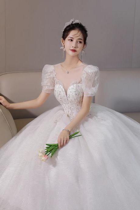 Elegant Puff Sleeve Beaded Bodice Bridal Gown
