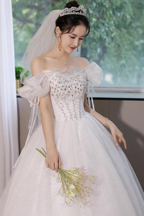 Elegant Off-shoulder Beaded Bodice Bridal Gown With Veil