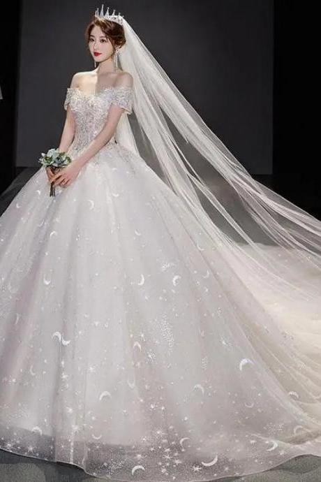 Elegant Off-shoulder Bridal Gown With Long Veil