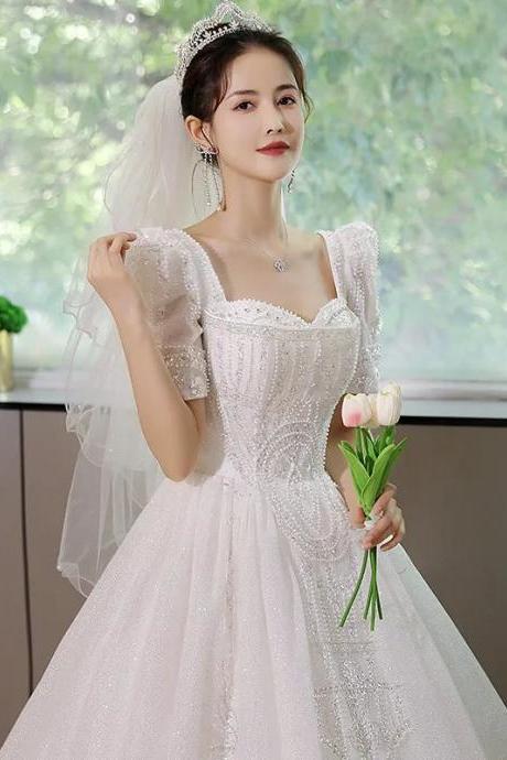 Elegant Sweetheart Neckline Sequined Bridal Gown With Veil
