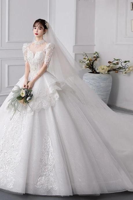 Elegant Long-sleeve Lace Bridal Gown With Train