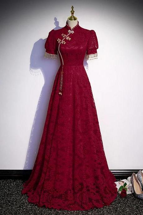 Elegant Burgundy Lace Evening Gown With Tassel Accents