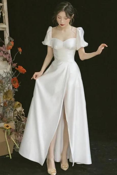 Elegant White Split-hem Bridal Gown With Puff Sleeves