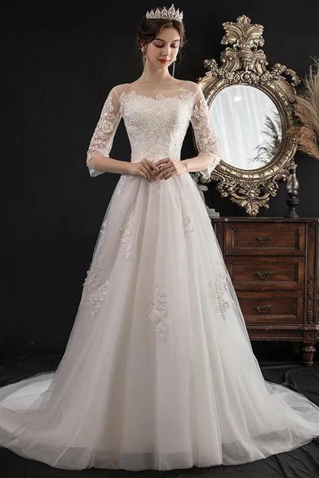 Elegant Long-sleeve Lace Applique Bridal Gown With Train