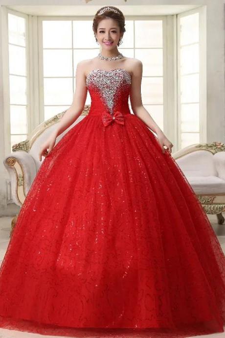Elegant Red Strapless Gown With Beaded Bodice And Bow