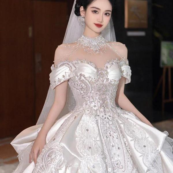 Elegant Off-Shoulder Crystal Beaded Bridal Gown with Veil