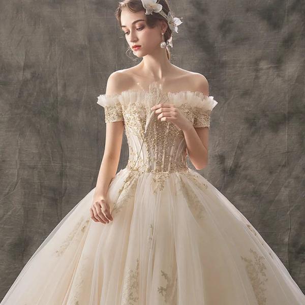 Elegant Off-Shoulder Tulle Bridal Gown with Floral Embroidery