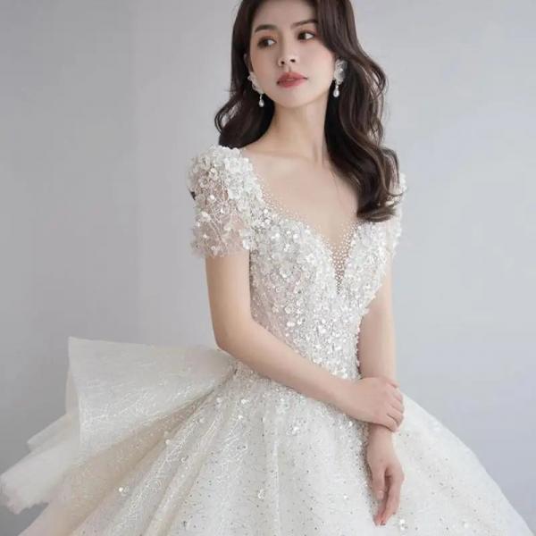 Elegant Sequined V-Neck Wedding Gown with Short Sleeves