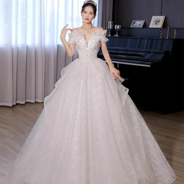 Elegant Off-Shoulder Lace Bridal Gown with Train