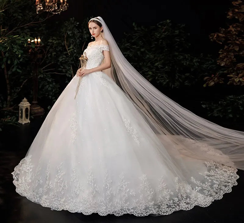 Elegant Off-shoulder Lace Bridal Gown With Train on Luulla