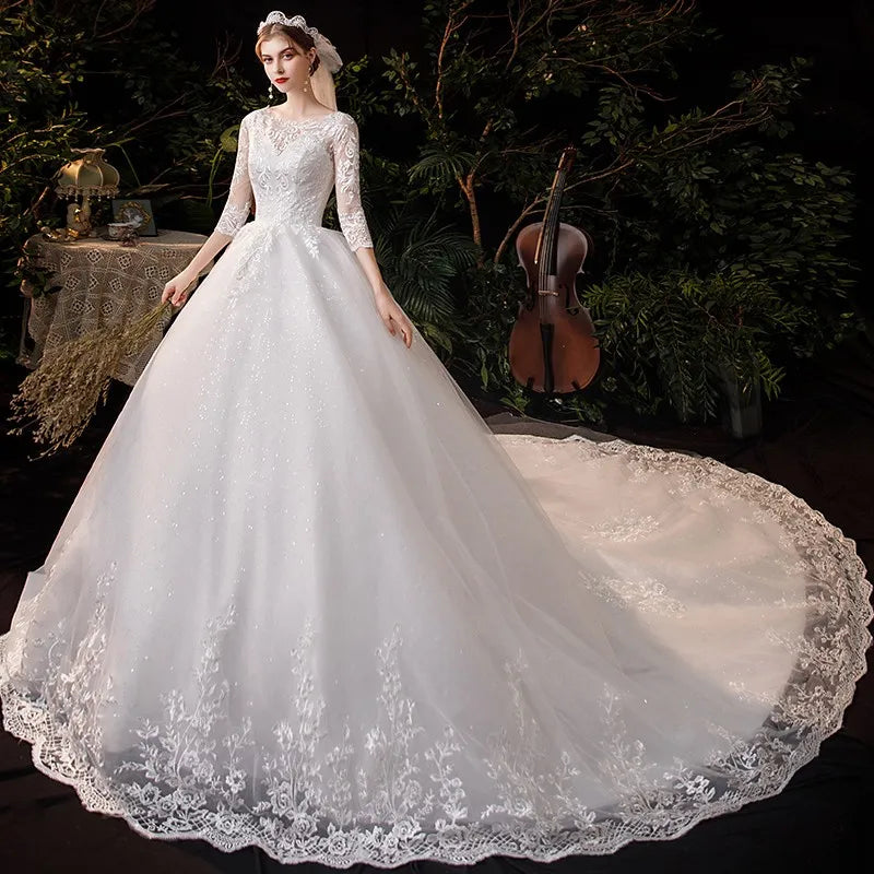 Elegant High-Neck A-Line Wedding Gown with Lace Sleeves and Open Back Design
