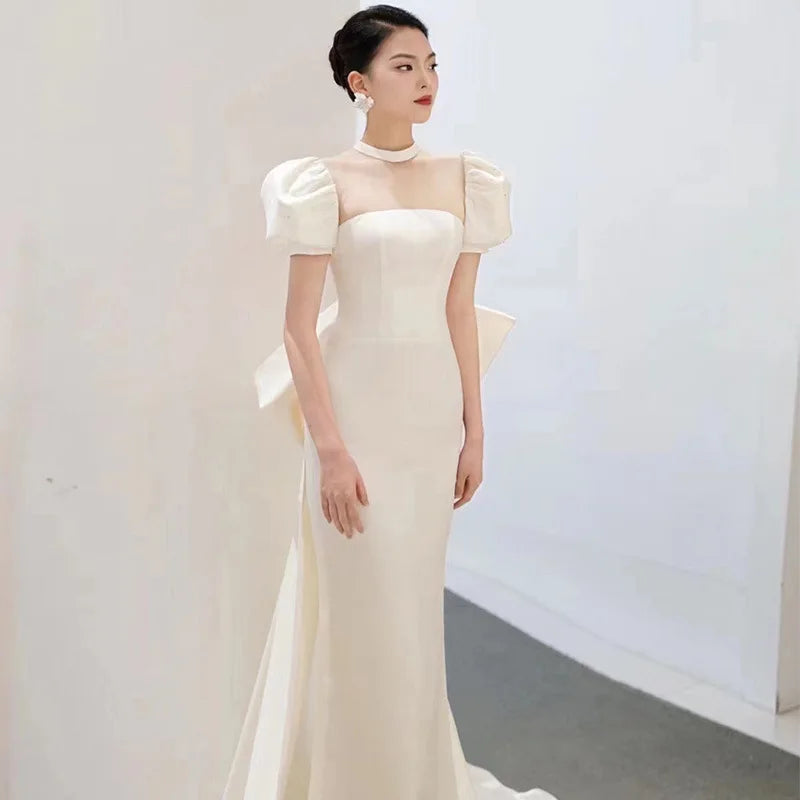 Stunning White Gown With Unique Bow Design on Luulla