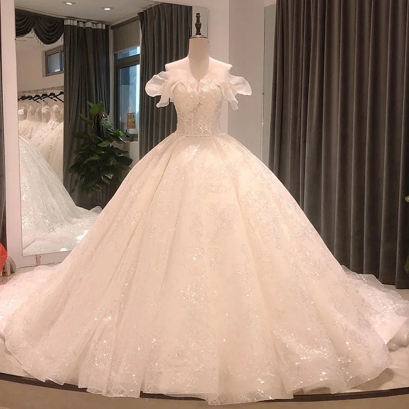 Bridal Gown With Puffy Sleeves And Lace Detailing on Luulla