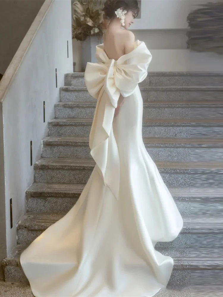 Ivory satin draped gown